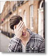 Man Covering His Eyes In A Laugh On The Street Metal Print