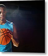 Man Holding Basketball Metal Print