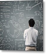 Man looking to formula and picture on blackboard Metal Print