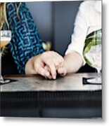 Midsection Of Lesbian Couple Holding Hands With Glasses Of Cocktail On Bar Counter Metal Print