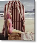 Model In Pink Swimsuit With Tent On Beach Metal Print