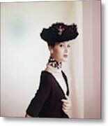 Model Wearing Black Hat With Feathers Metal Print