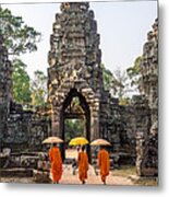 Monks With Umbrella Walking Into Angkor Wat Temple - Cambodia Metal Print