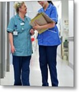 Nurses Talking In Corridor Metal Print