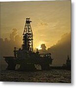 Offshore Oil Rig With Sun And Clouds Metal Print