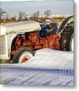 Old Tractor In The Snow Metal Print