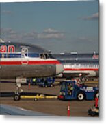 Passenger Airliners At An Airport Metal Print