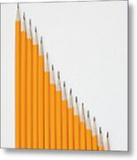 Pencils Sharpened Into Declining Scale Metal Print