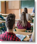 Rear View Of High School Students Attending A Class. Metal Print