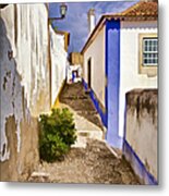 Secluded Cobblestone Street In The Medieval Village Of Obidos Metal Print