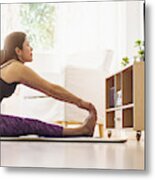 Side-view Of Woman Exercising In Living Room Metal Print