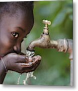 Social Issues: African Black Child Drinking Fresh Water From Tap Metal Print