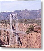 Suspension Bridge Across A Canyon Metal Print
