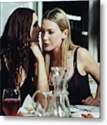 Two Young Women Talking At Dinner Party Metal Print