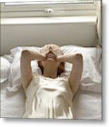 Woman On Bed With Hands Over Eyes Metal Print