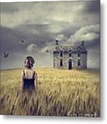 Woman Walking In Wheat Field With Abandoned House In Background Metal Print