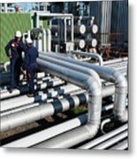 Workers Checking Pipework On An Oil And Gas Refinery Metal Print