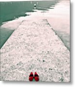 A Pair Of Red Women's Shoes Lying On A Walkway That Leads Into A Metal Print