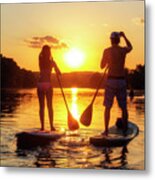 A Silhouette Of A Couple On A Stand-up Paddle Boards Sup At Sunset On Lady Bird Lake In Austin Texas Metal Print