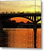 A Vivid Sunset Surrounds The Mexican Free-tailed Bats As They Fly Out Of Congress Avenue Bridge Metal Print