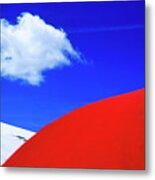 Bright Red Parasol Contrasted Against A White Glacier Metal Print