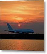 Commercial Jet Aircraft At Sunset Metal Print