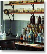 Desk With Bottles Of Chemicals Metal Print