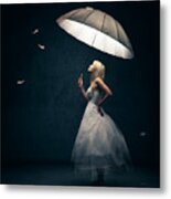 Girl with umbrella and falling feathers Metal Print