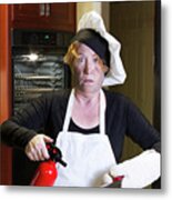Kichen Disaster In Apron With Fire Extinguisher And Pan Metal Print