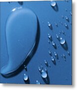 Large And Small Water Droplets Viewed From Above Metal Print
