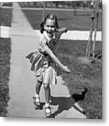 Little Girl Roller-skating On Sidewalk Metal Print