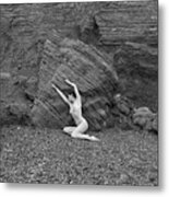 Nude Woman Pulling Shape By Rocks Metal Print
