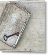 Rusty Key On The Old Tattered Book Metal Print