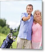 Senior Couple Showing Ok Sign On A Golf Course. Metal Print