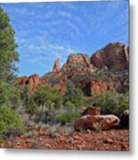 Sunlight Washes The Rugged Land Metal Print
