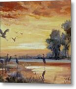 Sunset On The Marshes With Cranes Metal Print