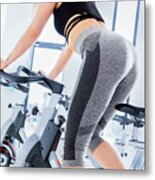 Young Woman During Spinning Class. Metal Print