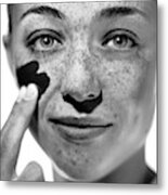 Woman Applying Sunscreen #3 Metal Print
