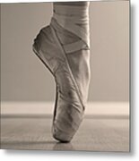 A Ballerinas Foot En Pointe Metal Print