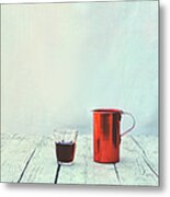A Glass Of Wine On A Table Metal Print