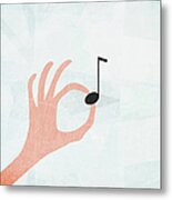 A Hand Holding A Musical Note Metal Print