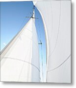 A White Sail Being Blown By The Wind Metal Print