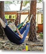 A Woman Reads A Book In A Hammock At A Glamping Camp Scene Metal Print
