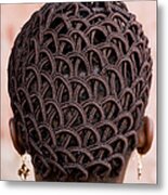 A Womans Head With Braided Patterned Metal Print