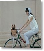 Audrey Hepburn Riding A Bicycle Metal Print