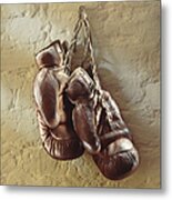 Boxing Gloves Hung Up On Wall Metal Print