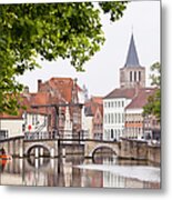 Canal Bridge At Potterierei In Bruges Metal Print