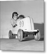 Child Sitting In Toy Car Metal Print