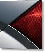 Close Up Of A Tail Light On A Silver Metal Print