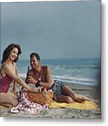 Couple Sitting On Beach Holding Beer Metal Print